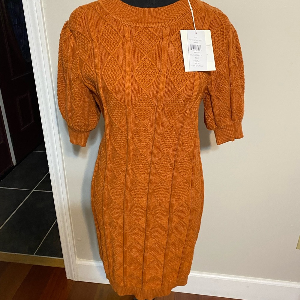 Balloon - sleeved knitted dress